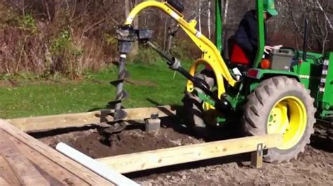 john deere compact tractor post hole digger|frame mounted post hole digger.